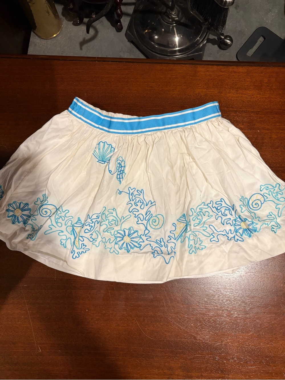 Lilly Pulitzer Girls White Mini Skirt with Turquoise Embroidery fully lined.